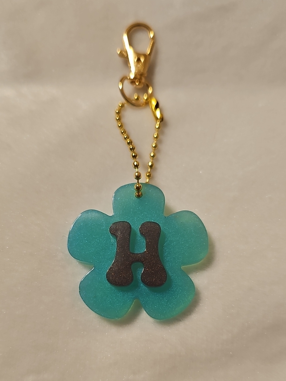 Teal and Purple Flower Keychain with 'H' Initial